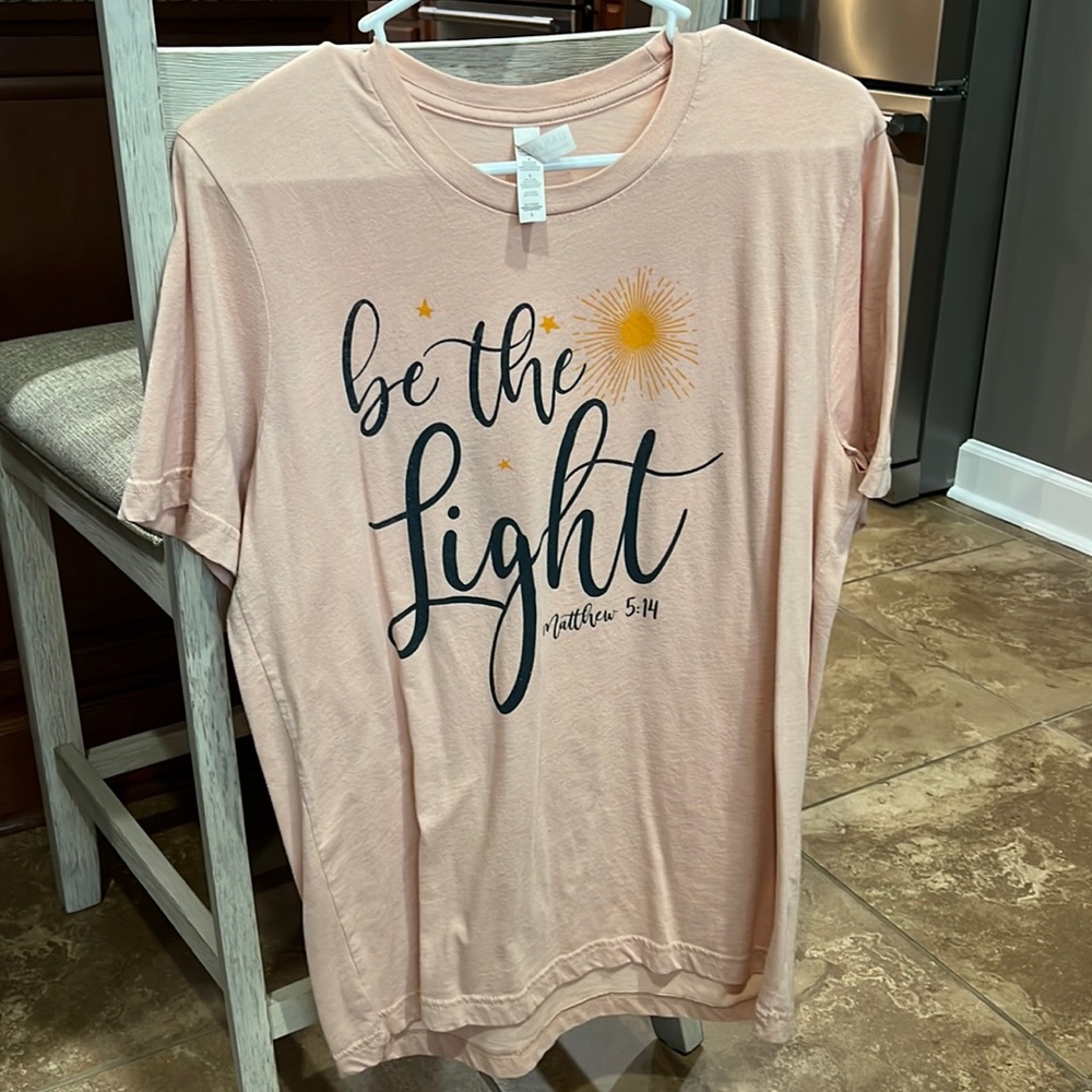 Size large bella canvas T-shirt with B the light on it